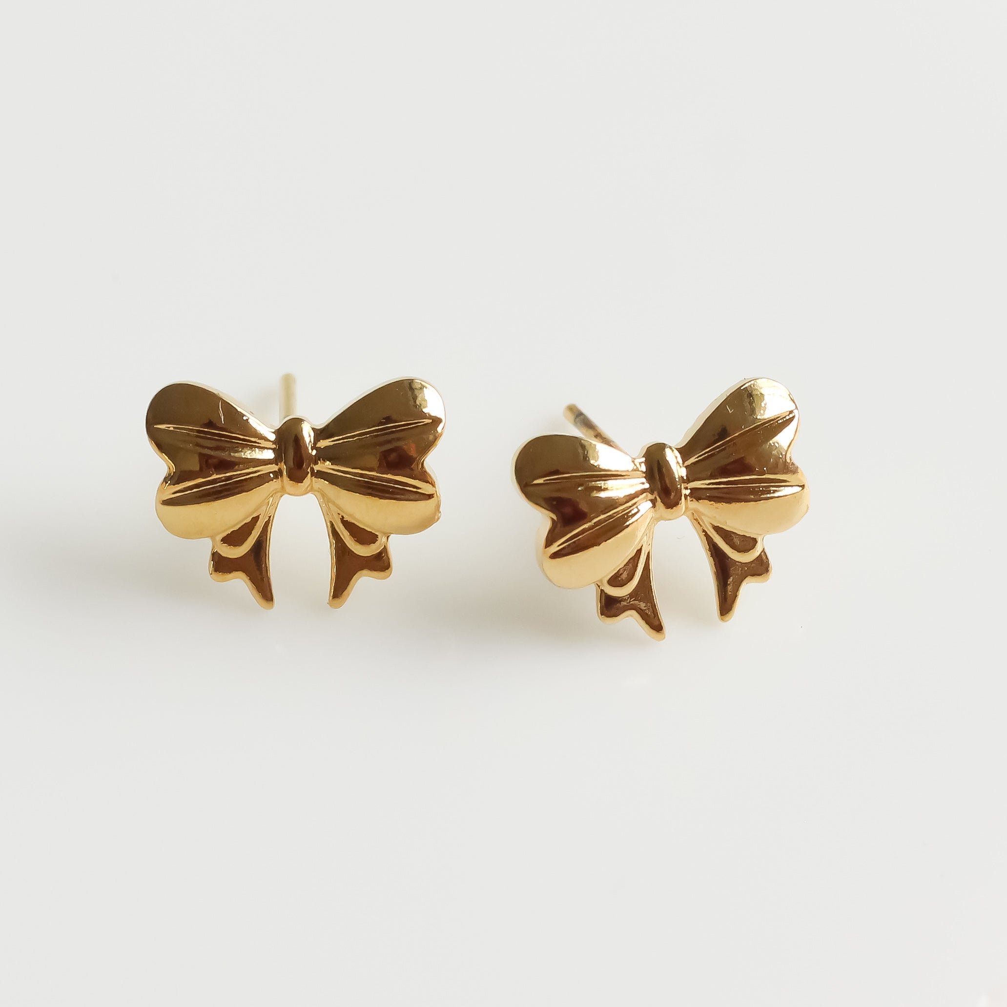 Gold Tiny Bow Studs